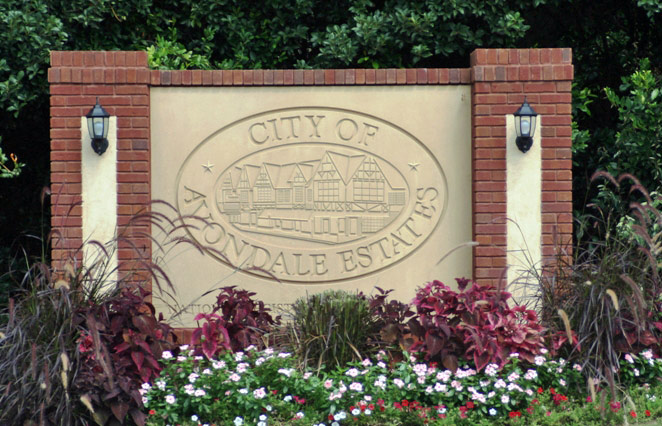 City of Avondale Estates is engraved on an entrance sign